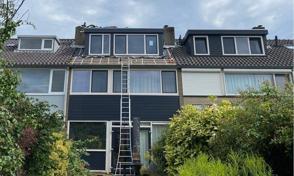 Wat kost een plat dak herstellen in Rheden?